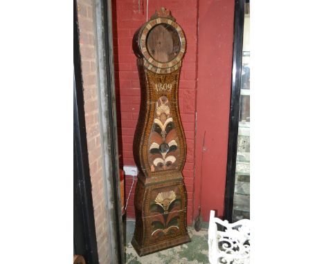 A French farmhouse longcase clock, case only, scumbled and painted with floral motifs, dated 1809 inside, Danish