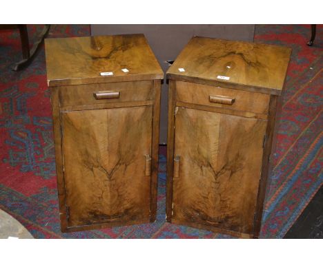 A pair of Art Deco walnut bedside cabinets