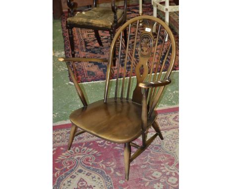 An Ercol splat back Windsor nursing chair