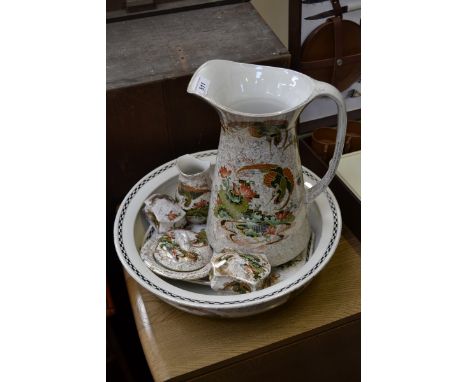 A Staffordshire Phoenix Ware wash set, comprising jug and bowl, dressing table tray, tooth brush jar, soap dish and cover, tr