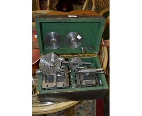 Scientific Instruments - a precision steel measuring gauge, with work top vice, painted pine case