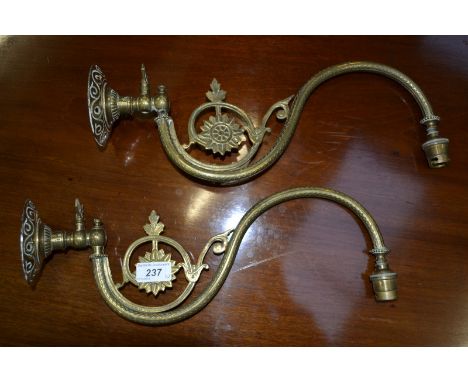 A pair of Victorian Aesthetic Movement swan neck lamp brackets