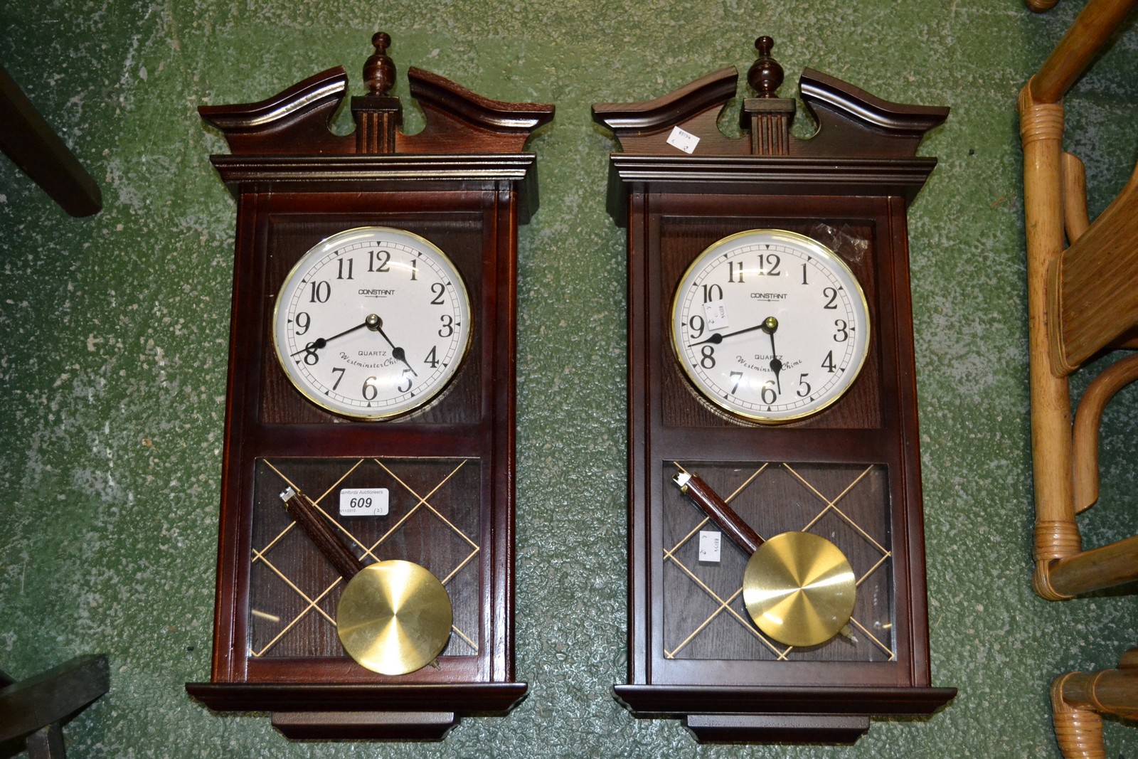 A pair of constant quartz Westminster chime wall clocks