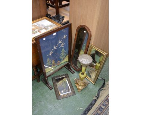 An early 20th century arch end mahogany mirror; another mirror; a framed print; a fire screen; an onyx smoker's stand (6)