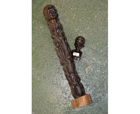 Tribal art - figure group, Mighty Father, carved as a man with children clinging to him; a bust of a native (2)