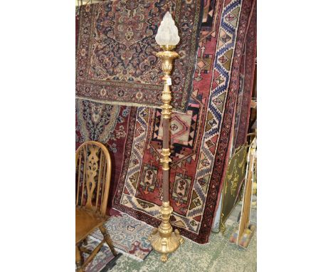 A 20th century gilt torchere lamp, tripod base, claw feet