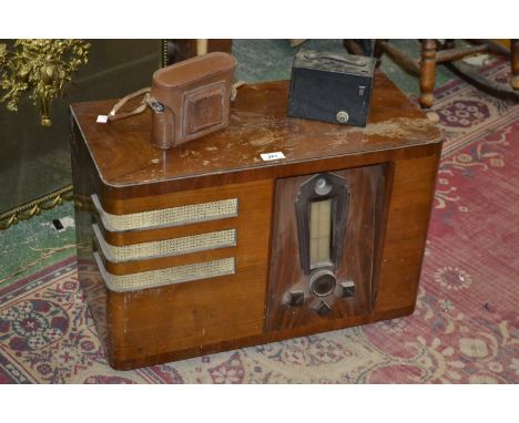 An Art Deco walnut veneered valve radio; an Agifold camera; another, Kodak 120 box camera (3)