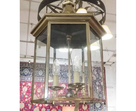 HALL LANTERN, brass of hexagonal form with glass panes and three lights, 102cm H x 46cm W.