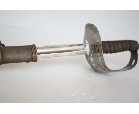 1845 blade by Wilkinson with 1895 hilt and metal scabbard