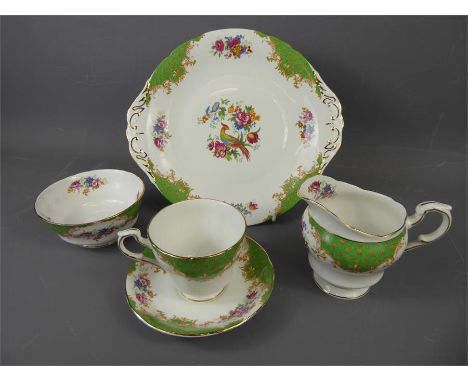 A Part Paragon 'Rockingham' Tea Set, comprising six teacups, six saucers, six cake plates, milk jug and sugar bowl. (20)
