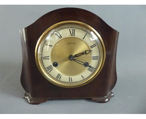 An Art Deco Bakelite Mantel Clock with Roman Numerals.