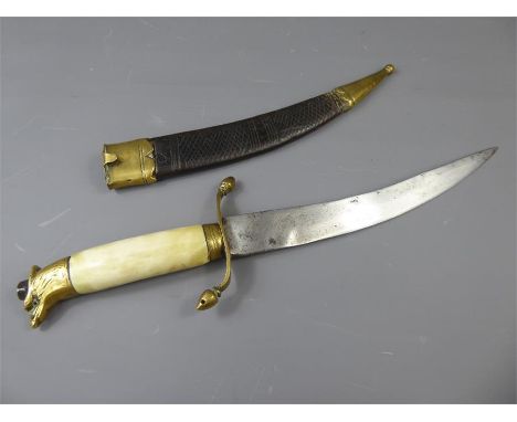 An Early 19th Century Georgian Midshipman Bone Handled Dirk, the dirk with curved handle and decorative brass cap depicting a