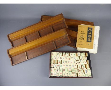 A Vintage Set of Mah-Jong, with accessories and manual.