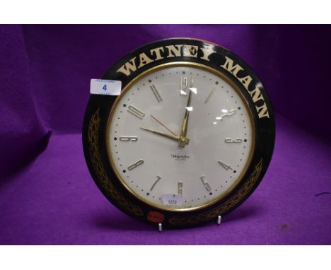 A vintage pub or tavern advertising wall mounted clock by Smiths for Watney Mann Ale

slight age related wear to paint and tw