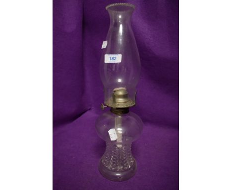 A Victorian pressed glass oil burning lamp
