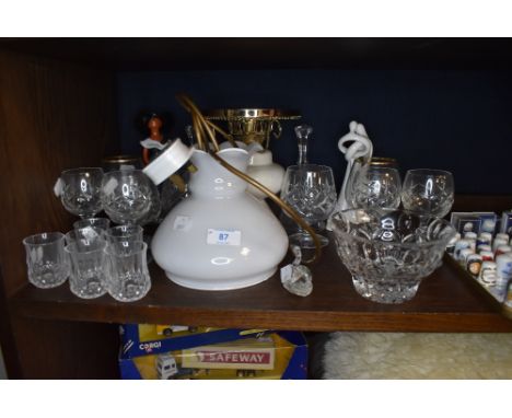 A variety of Bohemia crystal and similar glasses, also included is a desk lamp in the form of an oil lamp.