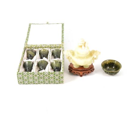 Chinese carved green jade type small bowl, 75mm; carved white jade type tripod censer with ringed lion handles and finial, on