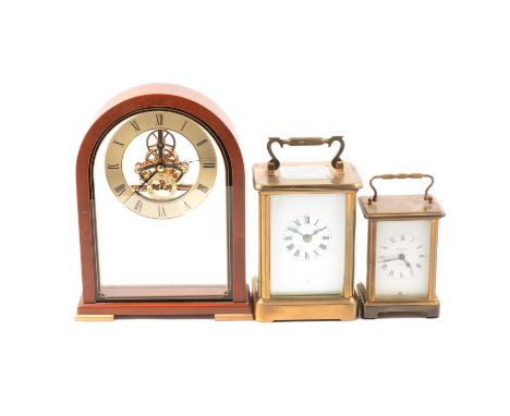 Large French brass carriage clock, standard case, rectangular enamelled dial, the movement striking on a bell, 16cm, a small 