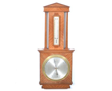 Edwardian mahogany barometer, architectural pediment, moulded outlines, silvered dials to the thermometer and aneroid baromet