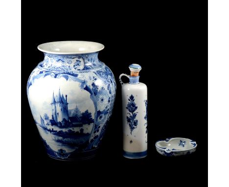 Dutch blue and white pottery bulbous shaped vase, Delft early 20th Century, the reserves with canal scenes, tall buildings, 3