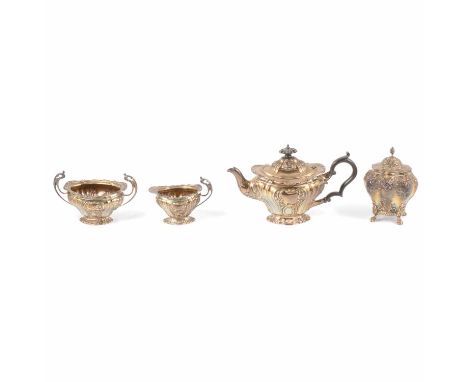 An Edwardian three-piece silver teaset, Barker Brothers, Birmingham 1901, scroll and floral decoration, vacant cartouches; an