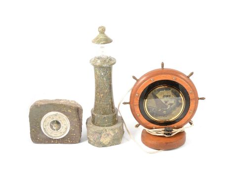 A sepentine lighthouse lamp, sepentine barometer, ships wheel lamp and cigarette box, a brass opium pipe.Qty: 5