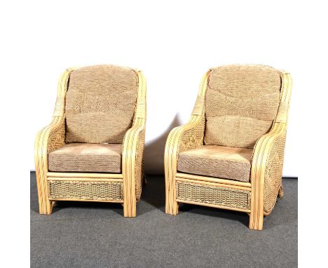 Pair of cane conservatory chairs, loose upholstered cushions, by Makasa, chair width 75cm, depth 100cm, height 98cm; matching