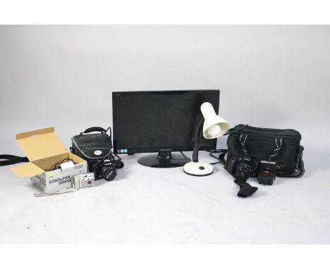 A Collection of Various Electrical Items to Comprise Olympus SP-57OUZ Camera, Minolta DYNAX 500SI, Lamp etc 