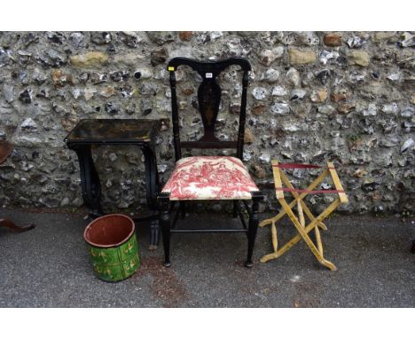 An antique ebonized chair; together with a nest of two tables, a painted wooden waste bin, folding stand, upholstered armchai