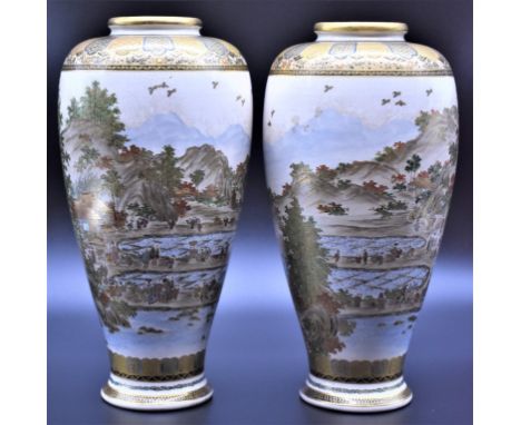 A good pair of large Japanese satsuma pottery vases, signed Cho Shuzan,&nbsp;each finely painted with a continuous landscape 