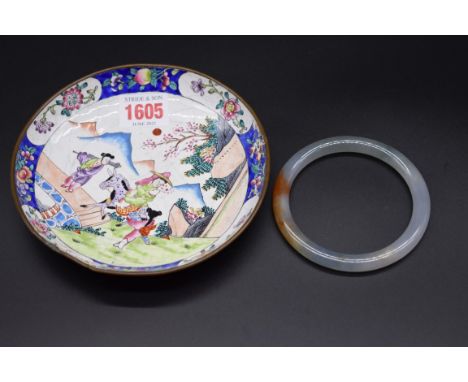 A Chinese Canton enamel dish,&nbsp;seal mark to base, 15cm diameter, (s.d.); together with a jade bangle. (2) 