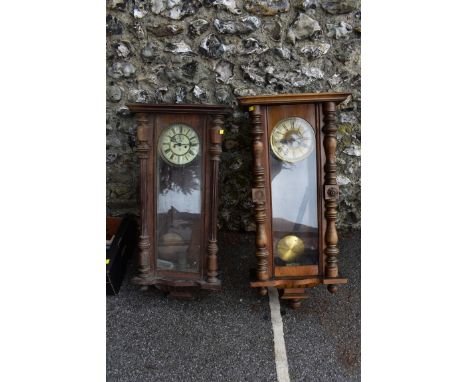 Two Vienna wall clocks; together with an onyx mantel clock.&nbsp;&nbsp;Collection of this lot is strictly by appointment on S