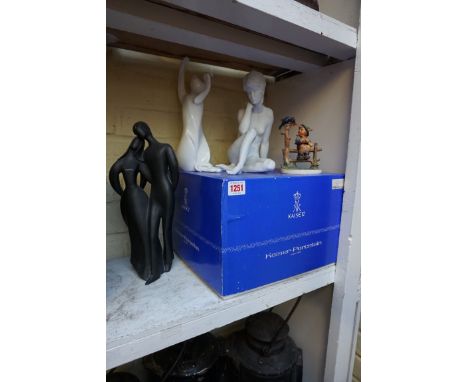A Kaiser blanc de chine figure of 'Meditation', 22.5cm high, boxed; together with two Royal Doulton figures; and a Hummel fig
