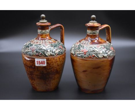 A pair of Victorian Doulton Lambeth 'Scotch Whisky' and 'Gin' flagons, each inscribed 'Made Only For G W Scott &amp; Sons', h