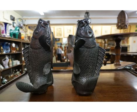 A pair of Japanese bronzed carp vases,&nbsp;27.5cm high. 
