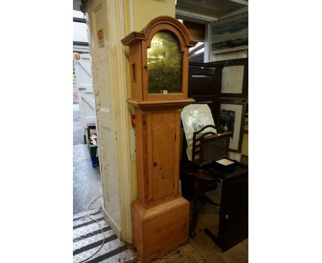 An antique pine eight day longcase clock,&nbsp;the 12in brass arched dial inscribed 'Thos Pryor, Helston', 196.5cm high, with