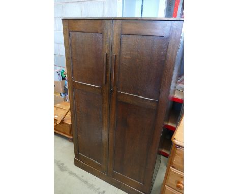 1930's oak 2 door bedroom cabinet 