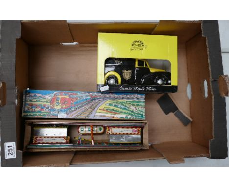 A mixed collection of items to include boxed tin plate local shuttle return train together with Ringtons ceramic model of Mor