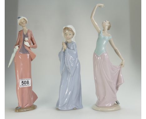 A collection of Nao figures to include lady with kitten, dancer, and child at prayer (height of tallest 33cm) (3)