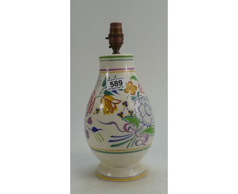 Poole pottery lamp base decorated with multicoloured flowers, height of pottery 26cm