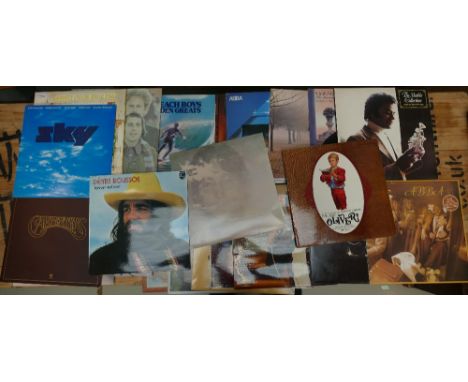 A collection of LP's dating from the 1970's and 80's to include Beach boys, Lionel Richie, Simon and Garfunkel, together with