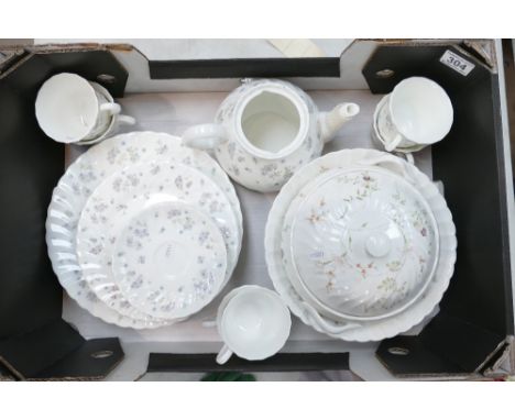 A mixed collection of Wedgwood April Flowers Dinnerware to include dinner plates, cups, saucers, side plates together with si