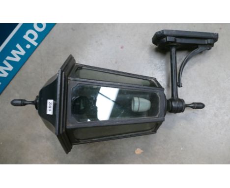 A black cast iron outside/street light 