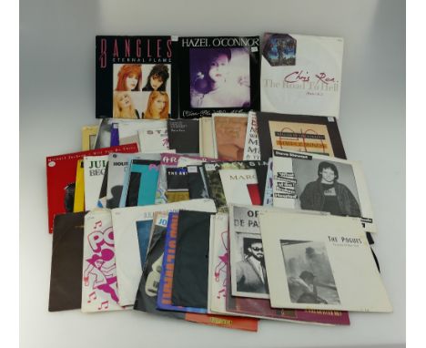 A mixed collection of 1980's and 90's singles to include Slade, The water boys, Berlin etc 