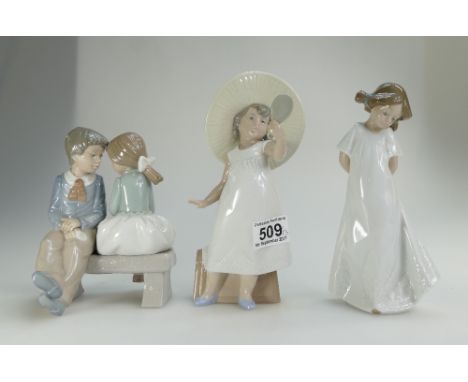 A collection of Nao figures to include young girl dressing up, young couple seated on bench, and bashful girl (3) (height of 