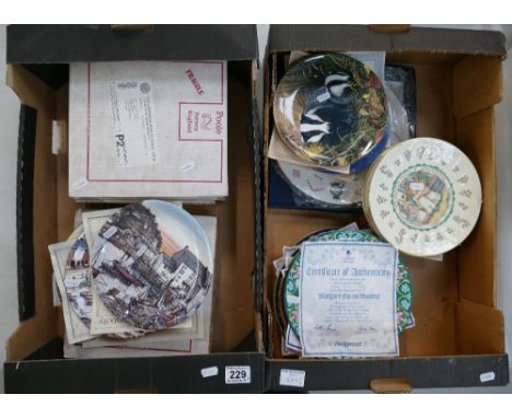 A large collection of Franklin Mint, Wedgwood, Poole, boxed decorative wall plates. (2 Trays)