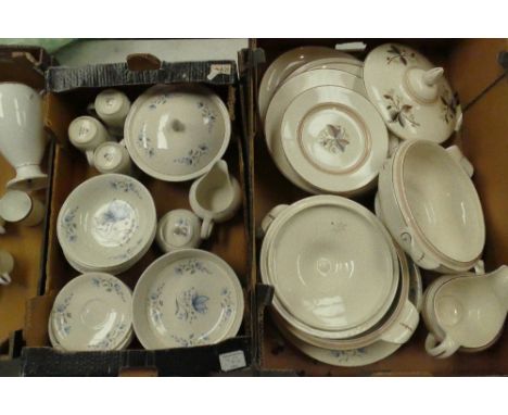 A large collection of Poole Pottery dinner ware with blue floral decoration to include tureens, cups, mugs, together with sim