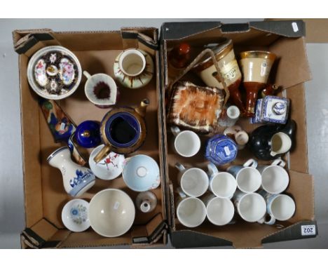 A mixed collection of items to include Wade whiskey bells and tea jars, Royal Doulton snowman mugs, early Courage pub jug, Ro