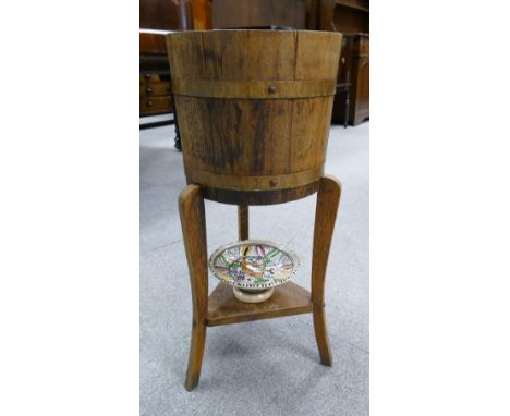 Lister & Co. barreled brass bound jardiniere/plant stand on square legs with a small ceramic tea stand (2)