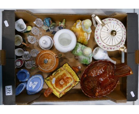 A mixed collection of items to include cottage ware teapots, large Earthen ware egg holder, Saddlers floral decorated teapot,